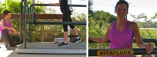 A woman demonstrating the applications for rider fitness of the Vitafloor equine vibration therapy system