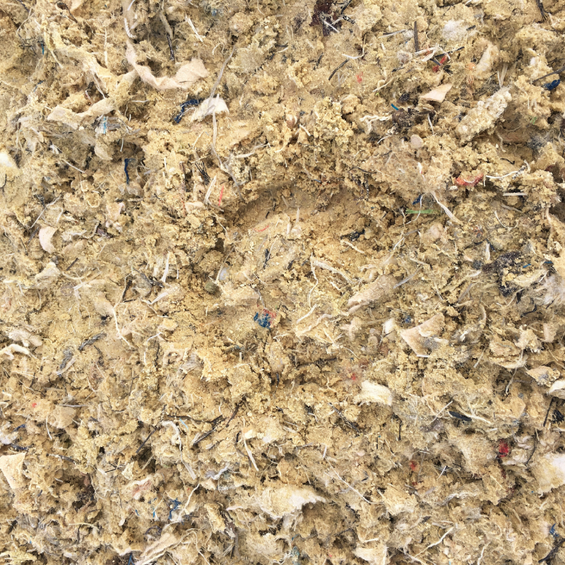 fibremixv2 A horse hoof print in a sample of Equivia fibremix equestrian surface
